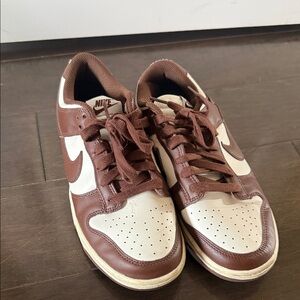 Brown woman’s Nike dunk low